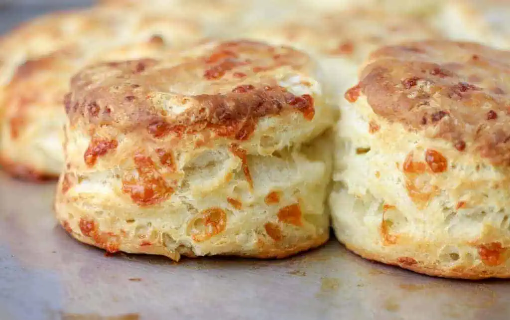 What are the secrets to achieving light and fluffy gluten-free biscuits?